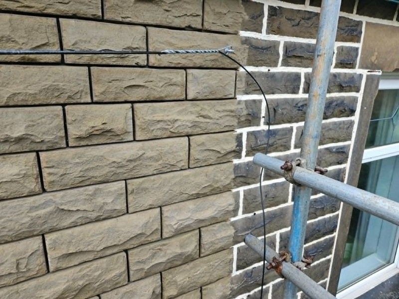 Half sand blasted stone wall to show the difference.