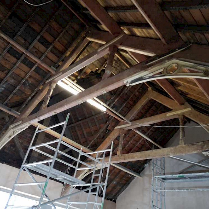 Before picture of a roof trusses.