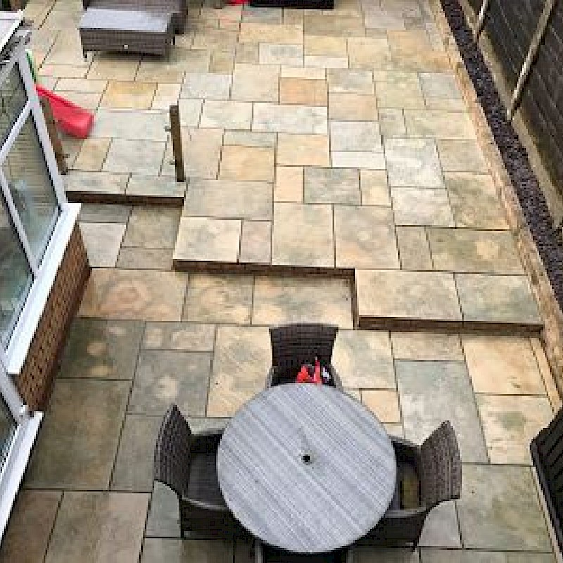 After picture of a back garden cleaned.